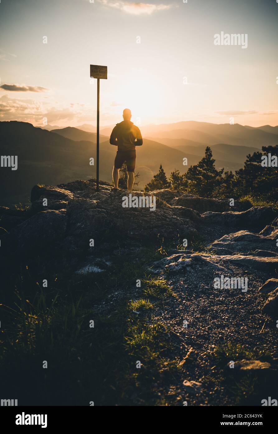 Man on top of mountain sunset hi-res stock photography and images - Alamy