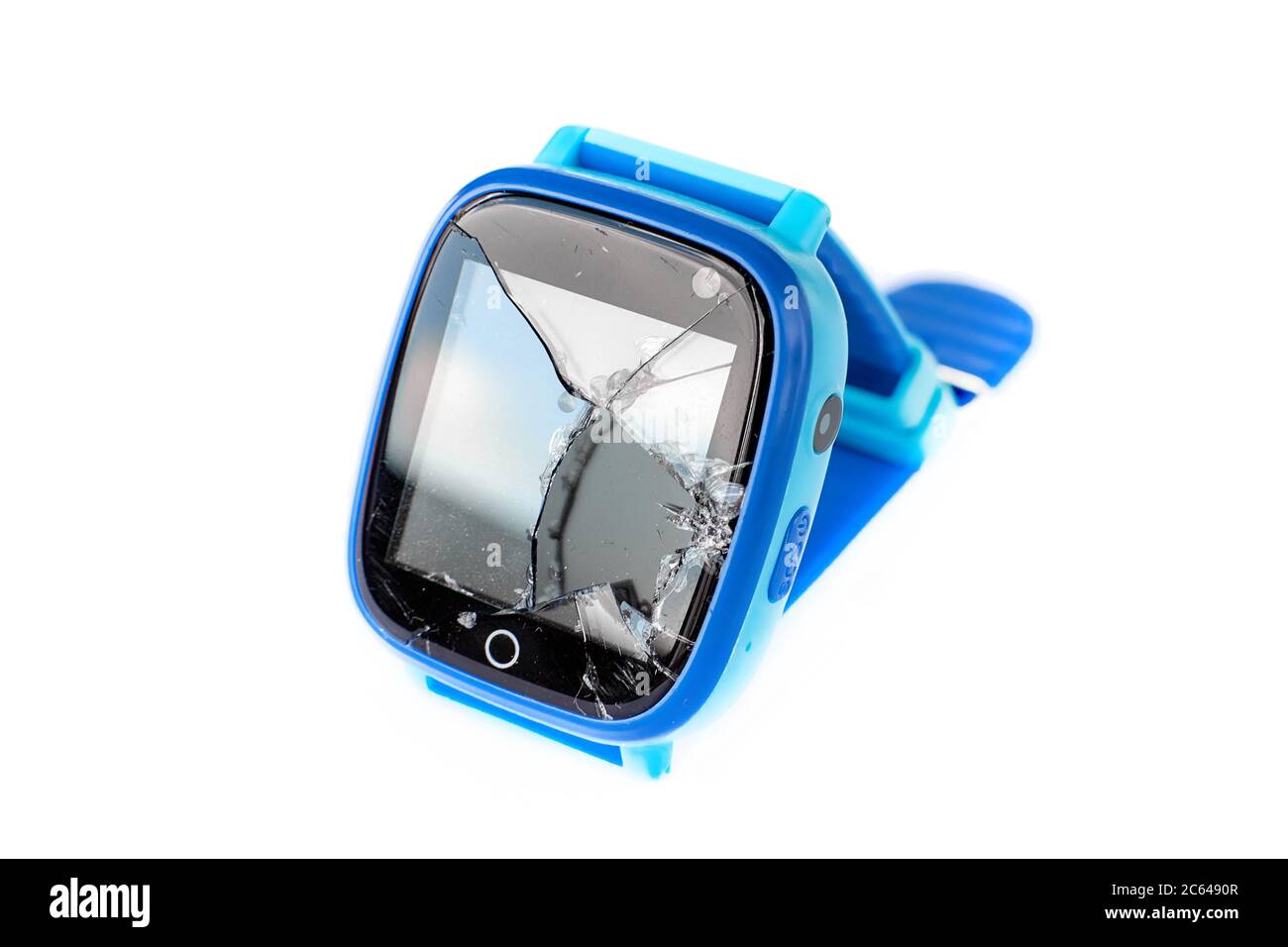 Multicolored kids smart watch phone with broken screen isolated on white background. Technology for children. Wearable gadget concept. Top view, close Stock Photo