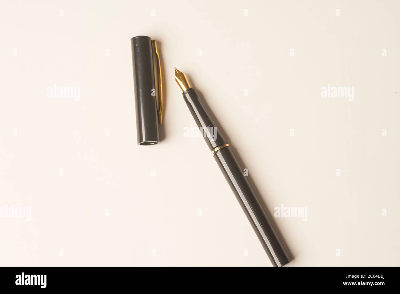 Calligraphy pen isolated on white background Stock Photo - Alamy