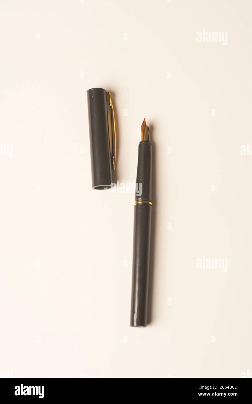 Calligraphy pen isolated on white background Stock Photo - Alamy