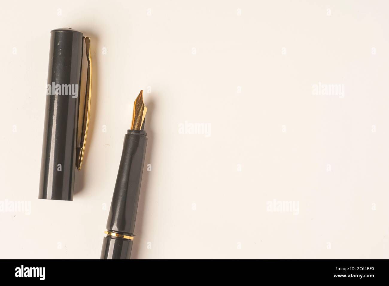 Calligraphy pen isolated on white background Stock Photo - Alamy