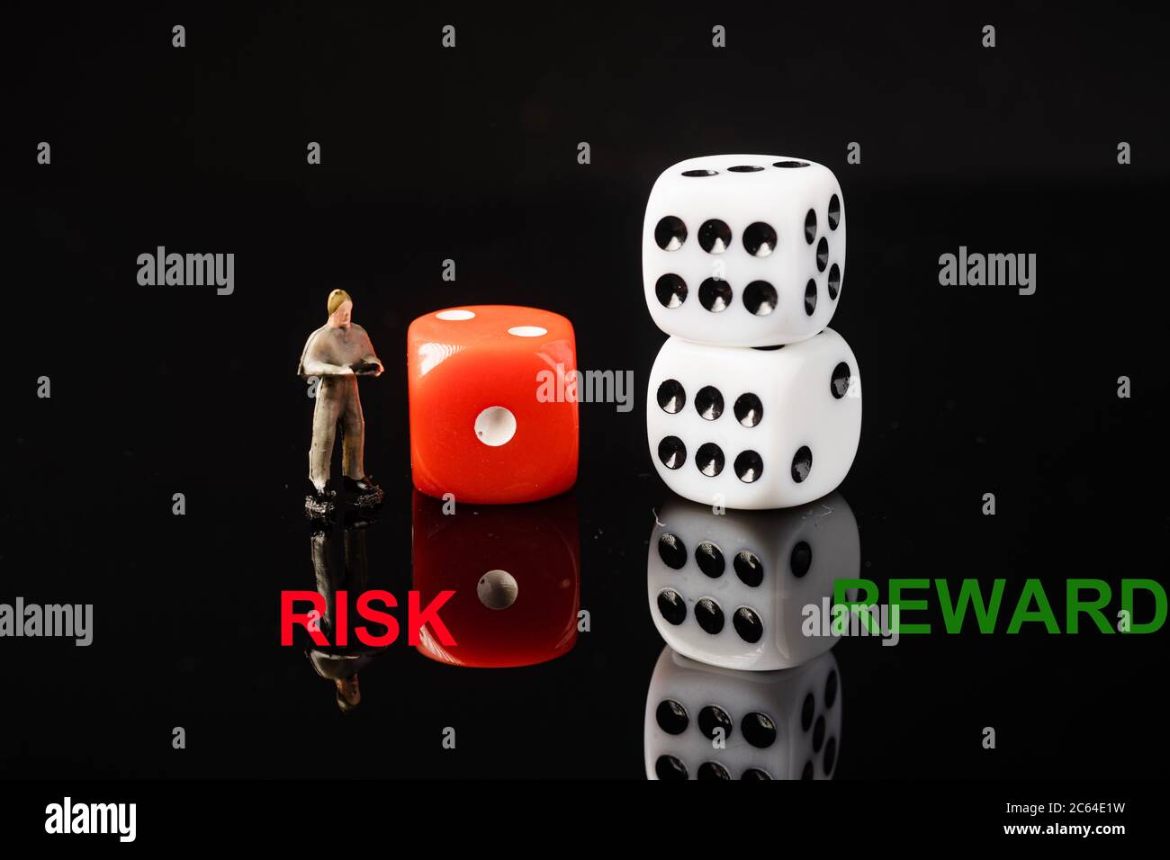 Reward Risk Dice “RISK VS REWARD” wordings with red and white dices, conceptual shot ...