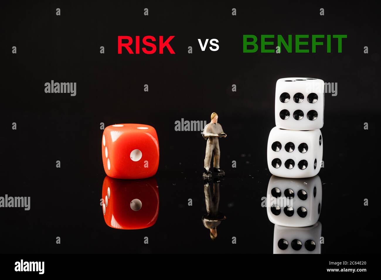 Reward Risk Dice “RISK VS REWARD” wordings with red and white dices, conceptual shot ...