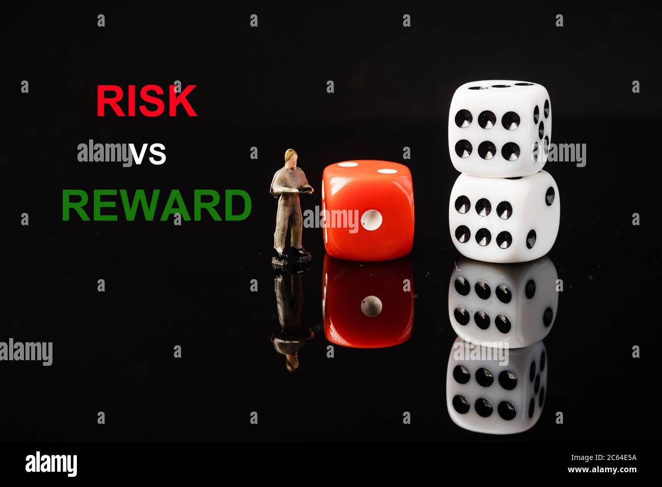 Reward Risk Dice “RISK VS REWARD” wordings with red and white dices, conceptual shot ...