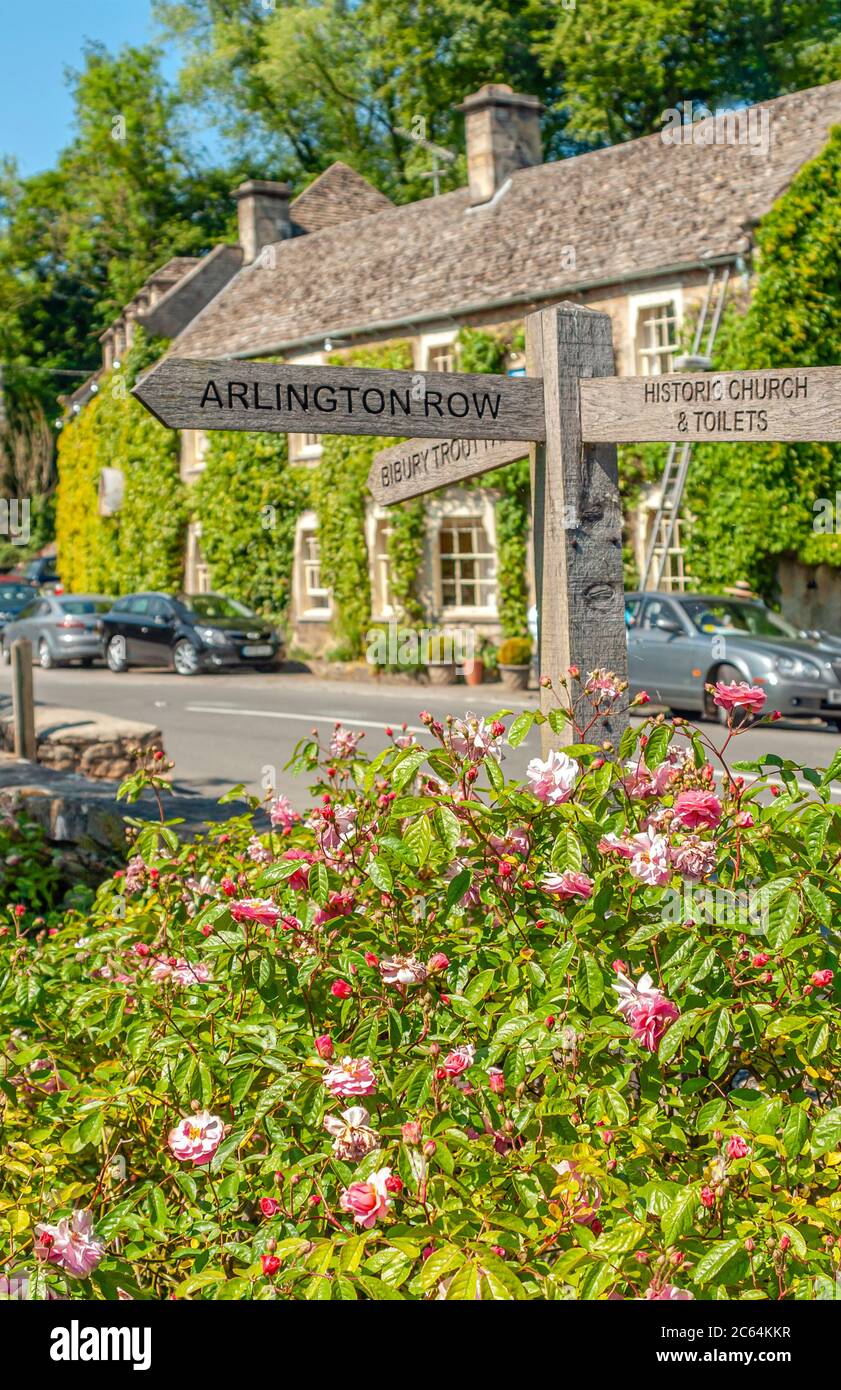Wooden signboard in Bibury, Cotswold District, Gloucestershire, England, UK Stock Photo