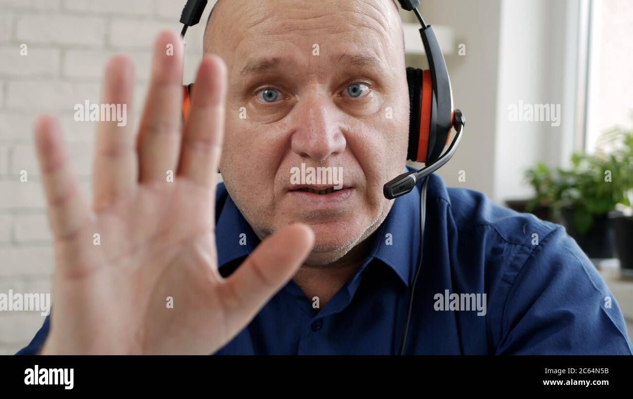 Man Working Remote from Home Using Laptop Connection Stock Photo