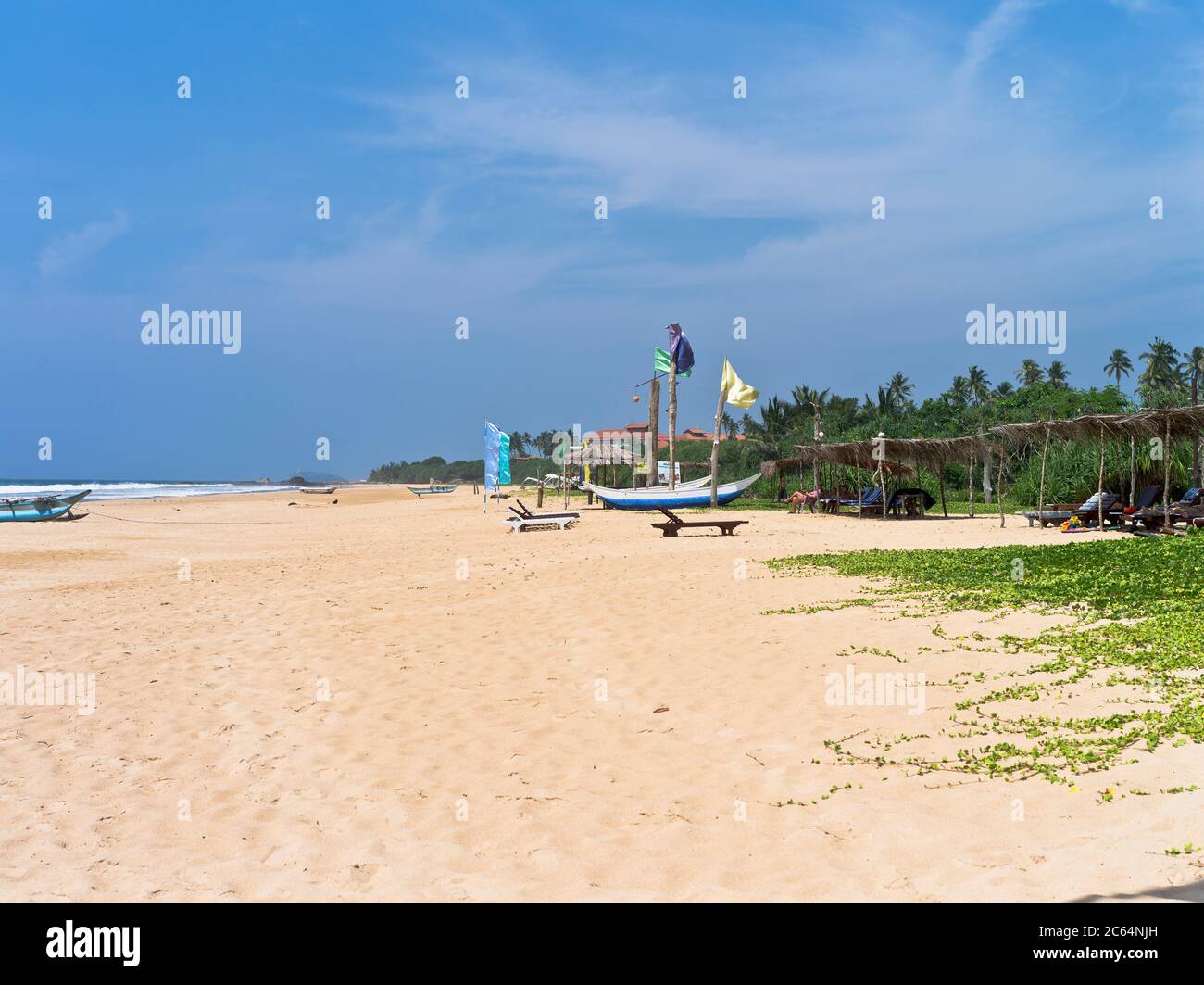 dh Robolgoda Beach Galle Road BENTOTA SRI LANKA Sri Lankan West coast hotel beaches flags sand shore asia Stock Photo