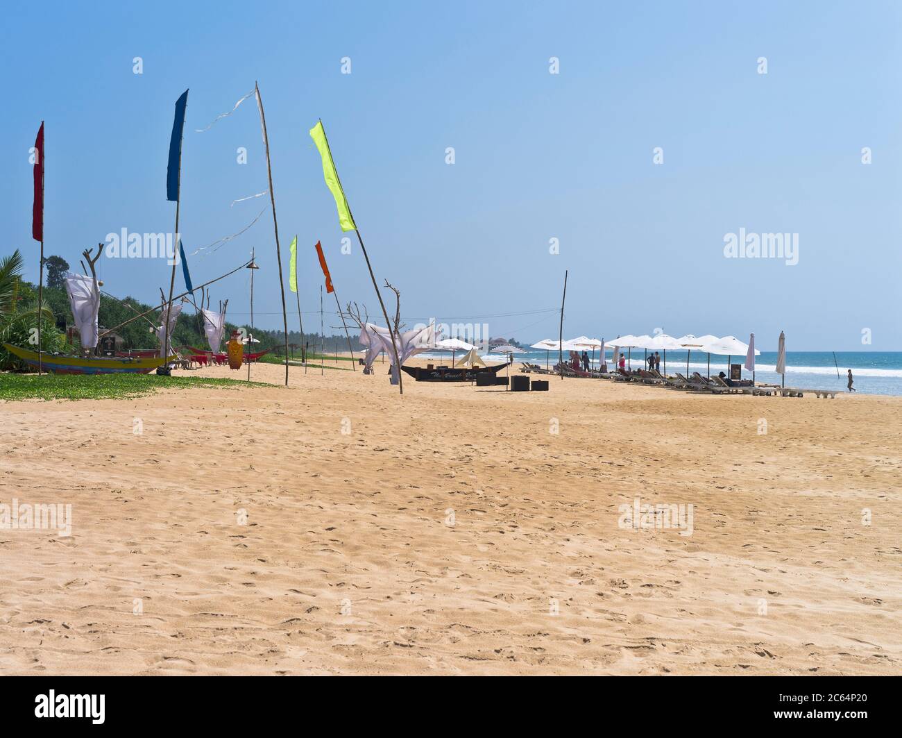 dh Robolgoda Beach Galle Road BENTOTA SRI LANKA Sri Lankan West coast hotel beaches flags sand shore Stock Photo