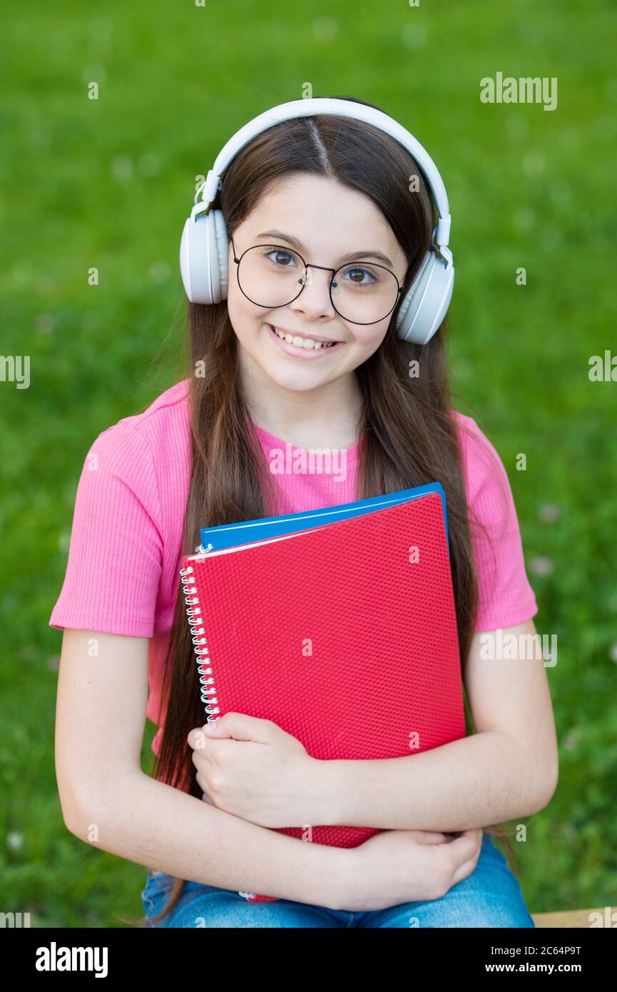 Audio listening and study. Happy child enjoy listening to music. Small girl  practise listening skills. Listening course. Distance learning. School and  education. Modern life. Feel language of music Stock Photo - Alamy