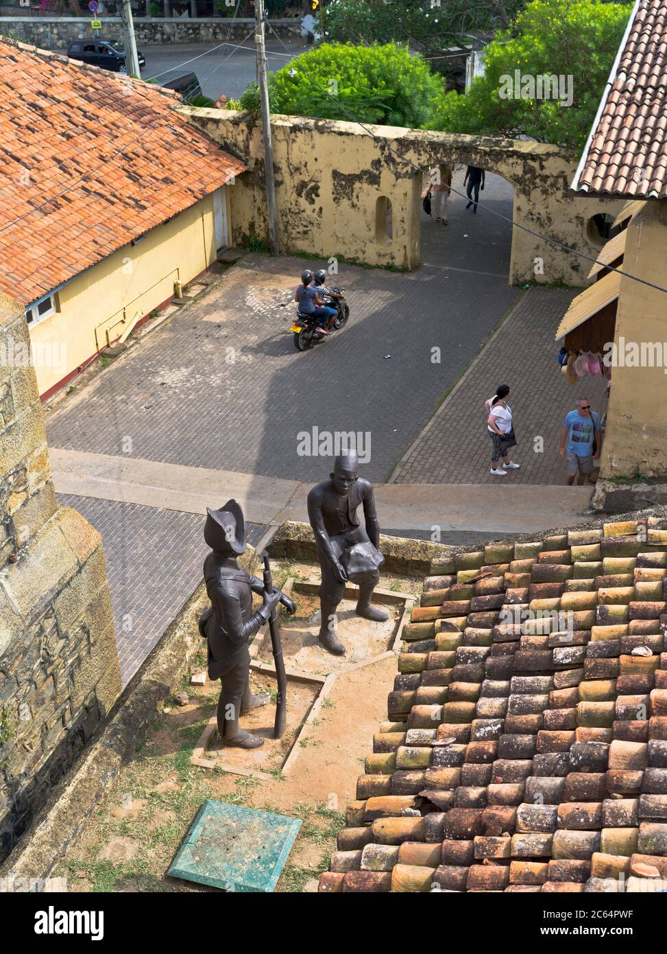 dh Colonial forts GALLE FORT SRI LANKA Soldier Statues tourist motorcycle dutch fortress holiday tourists people statue Stock Photo