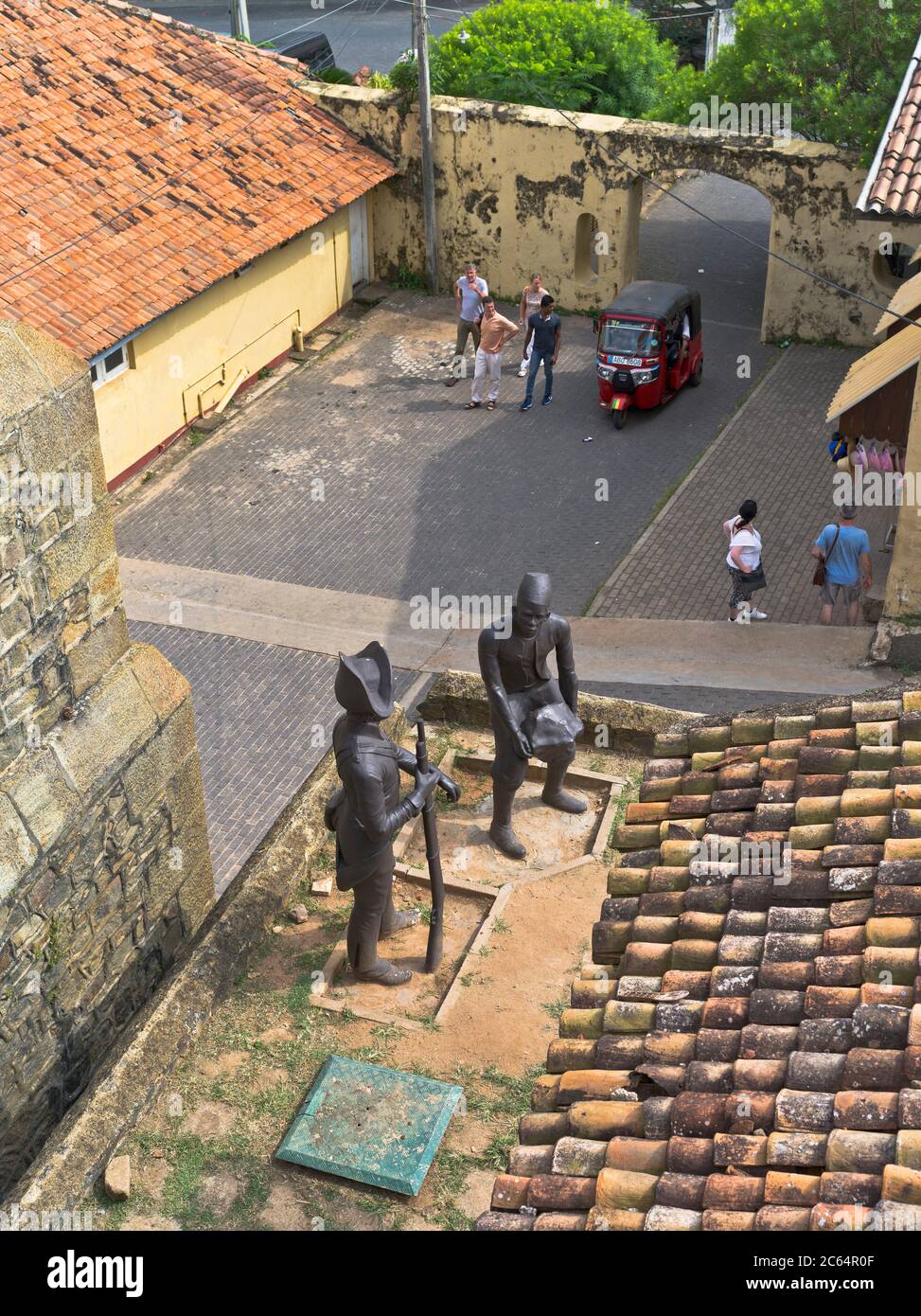 dh Colonial forts GALLE FORT SRI LANKA Soldier Statues tourists tuk tuk dutch fortress people holiday Stock Photo