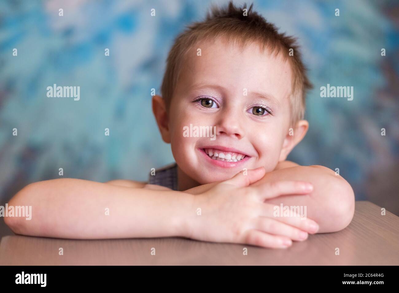Little cute girl smiling at the camera Stock Photo - Alamy