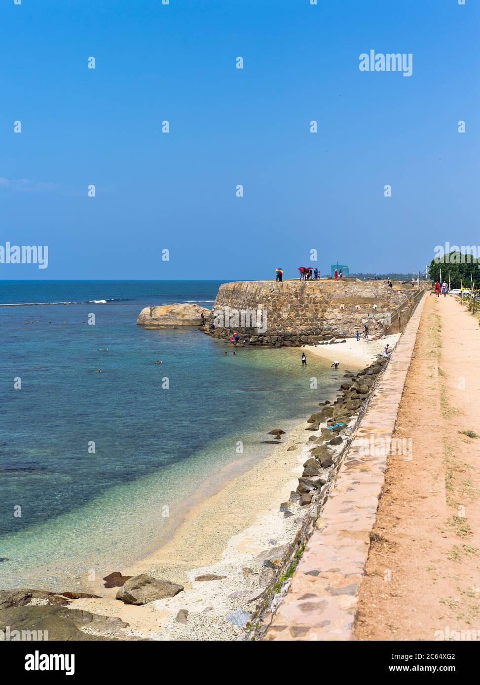 dh Colonial forts ramparts GALLE FORT SRI LANKA Dutch Fortress wall rampart battlements beach of people Stock Photo