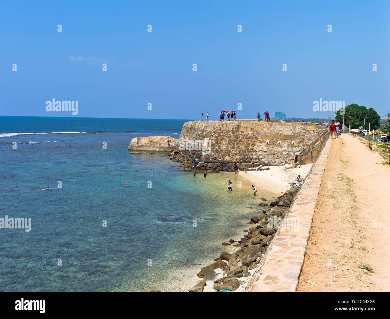 dh Colonial forts ramparts GALLE FORT SRI LANKA Dutch Fortress wall rampart battlements beach of people Stock Photo