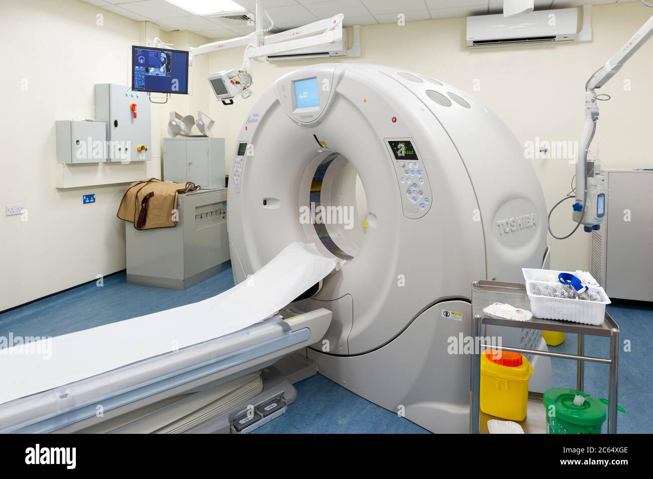 A CT Scanner in a hospital department. A computerized tomography scan (CT or CAT scan) uses computers and rotating X-ray machines Stock Photo