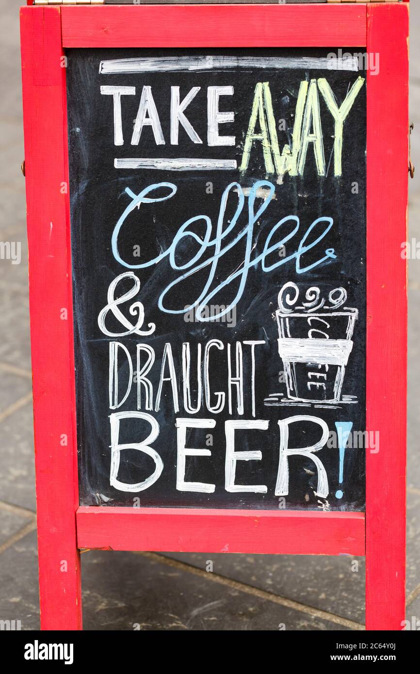 A sign advertising takeaway coffee and draught beer, Scotland, UK Stock Photo