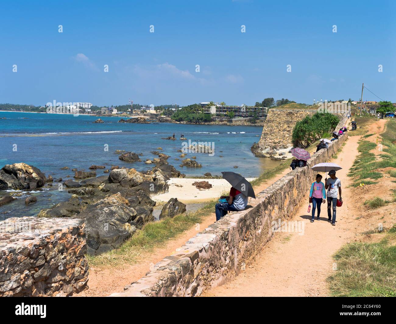 dh Colonial forts Dutch ramparts GALLE FORT SRI LANKA Sri Lankan courting couples walking Fortress wall of rampart battlements people couple Stock Photo