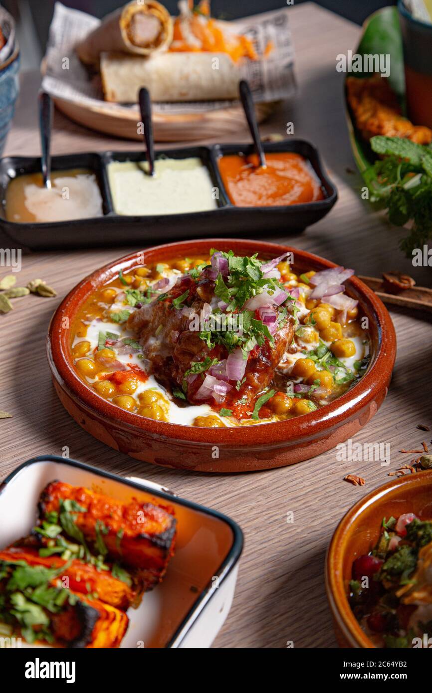 Variety of typical dishes of Indian culture. Vertical image. Stock Photo