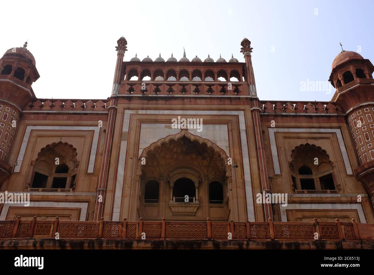 Photograph showcasing the main entrance, minarets, and balconies of Safdar Jang tomb, Delhi, India Stock Photo