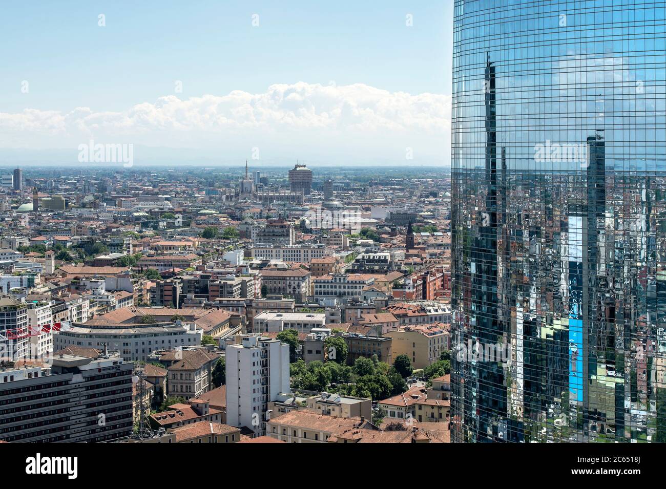 Italy, Lombardy, Milan, cityscape with reflection on Unicredit Tower Stock Photo