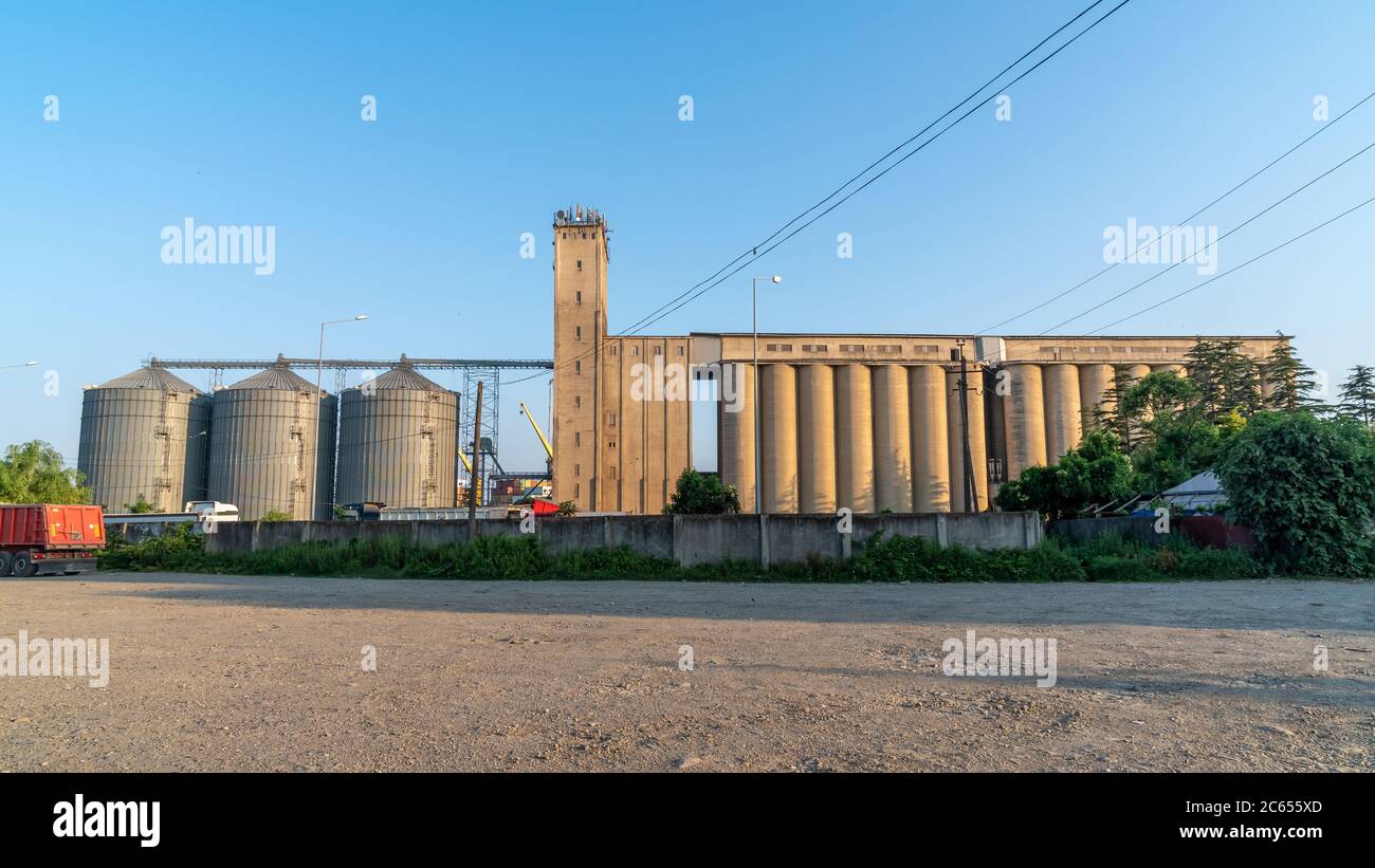 flour mill grain elevators and railroad tracks Poti, Stock