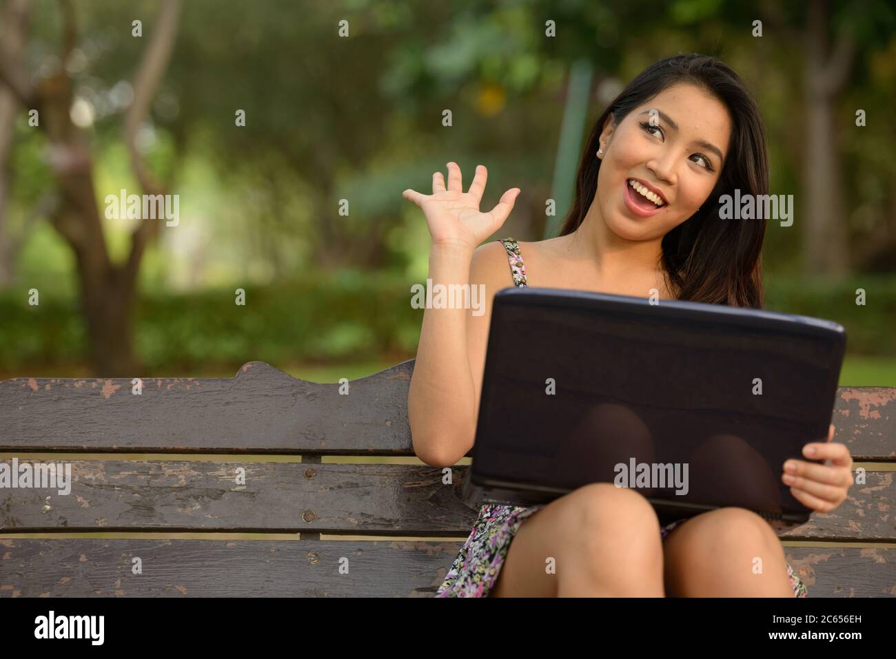 Portrait of young beautiful Asian woman at the park outdoors Stock ...