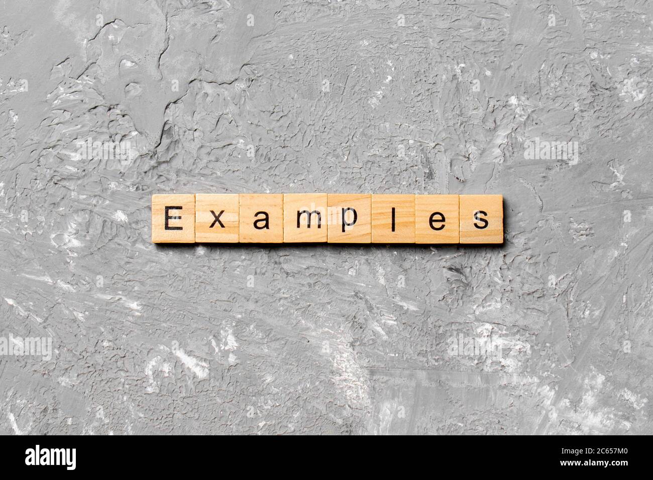 examples word written on wood block. examples text on table, concept. Stock Photo