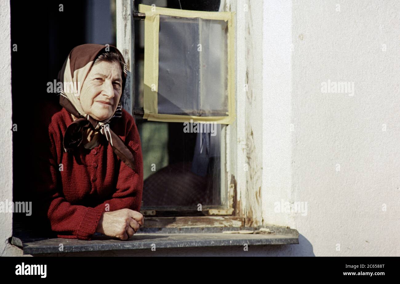 13th March 1994 During the war in Bosnia: a Bosnian Muslim woman inside the Muslim village of Rotilj, where everyone is under detention by the Bosnian Croats. Stock Photo