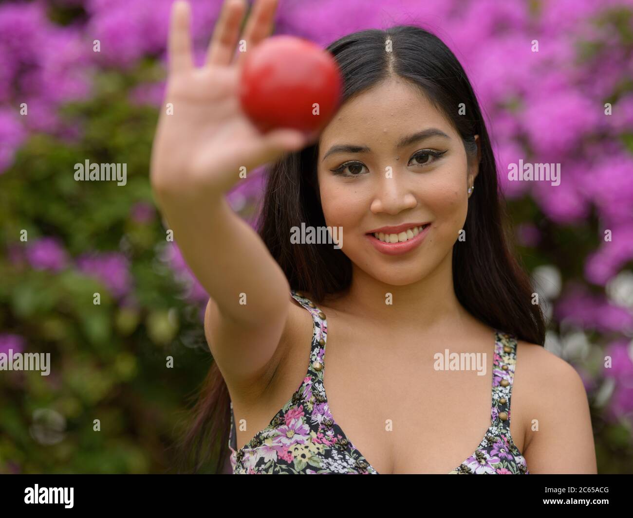 Portrait of young beautiful Asian woman at the park outdoors Stock ...