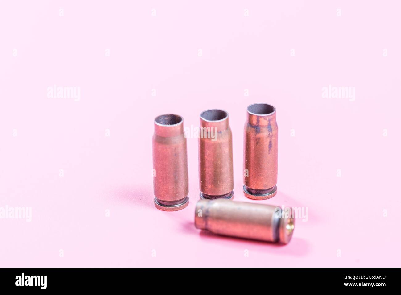 Bullet shell with pink background Stock Photo