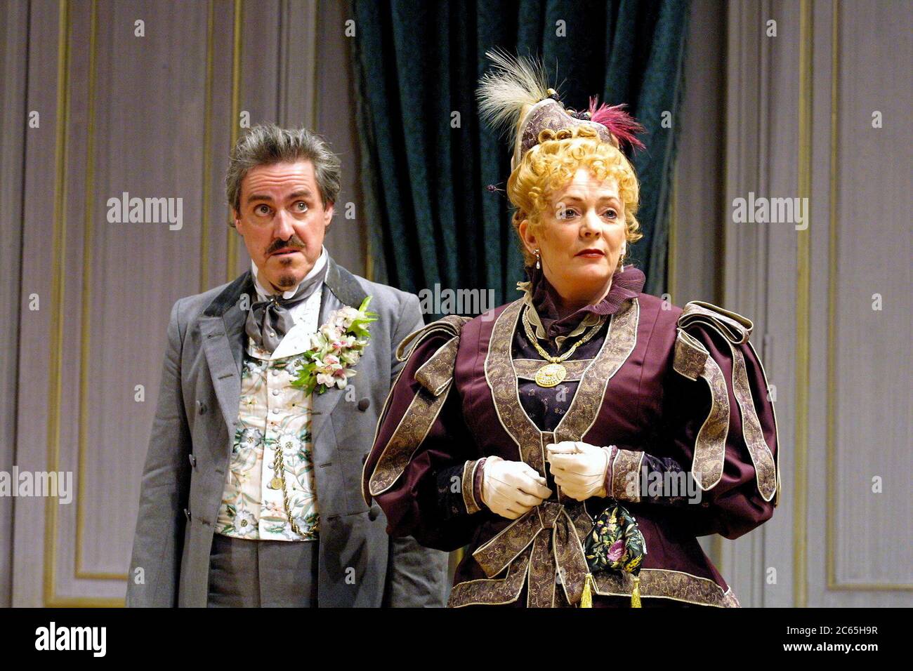 Griff Rhys Jones (Barillon), Alison Steadman (Madame Jambart) in HORSE AND CARRIAGE by Georges Feydeaux & Maurice Desvallieres at the West Yorkshire Playhouse, Leeds, England  07/11/2001  adapted by Graeme Garden  design: Tim Reed  lighting: Adam Silverman  director: Deborah Norton Stock Photo