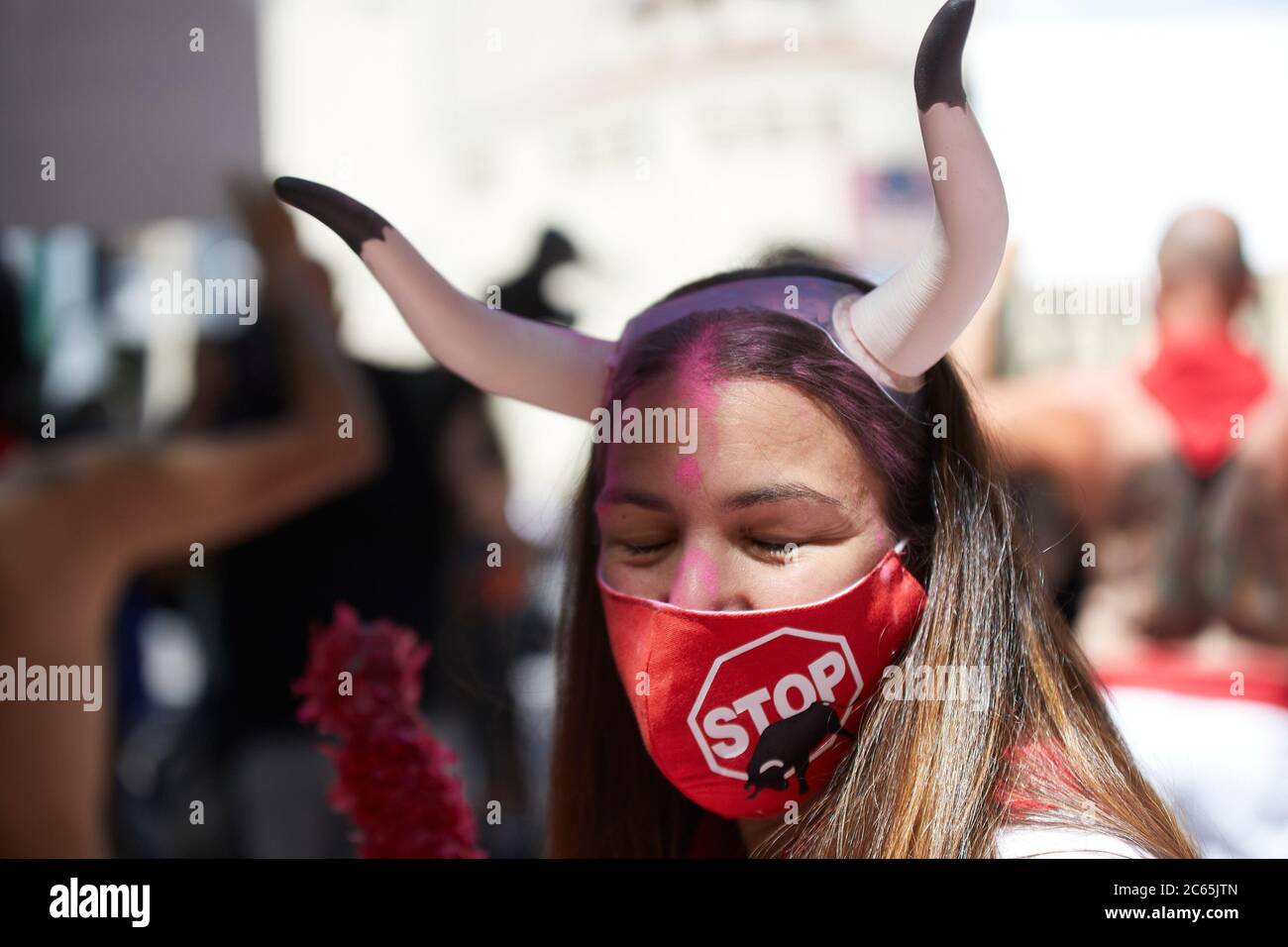 Pamplona. Spain. 7th Jul, 2020. Activists of the PETA and AnimaNaturalis collectives protest on the descent to the alley of the bullring in Pamplona to demand an end to the bullfights in Sanfermines, suspended this year due to the Covid-19 pandemic. Credit: Iñigo Alzugaray/Alamy Live News Stock Photo