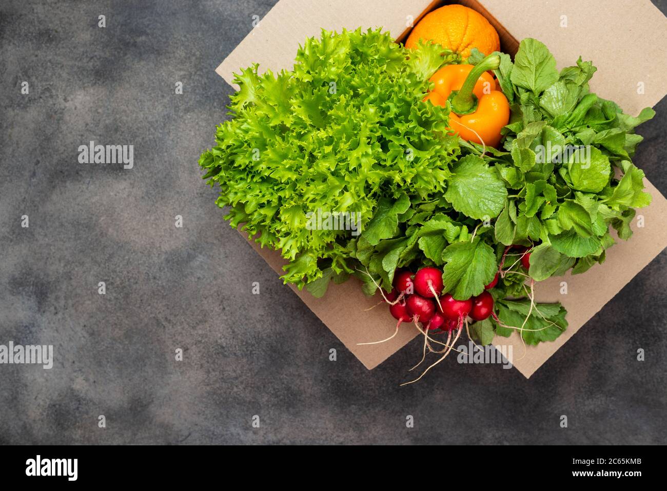 Farm food delivery. Organic vegetables in the box. Top view Stock Photo
