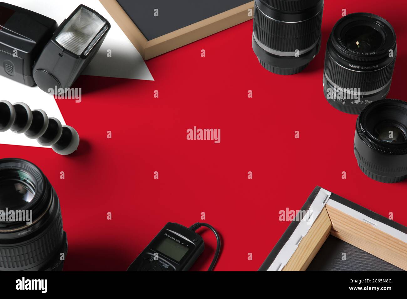 Bahrain national flag with top view of personal photographer equipment