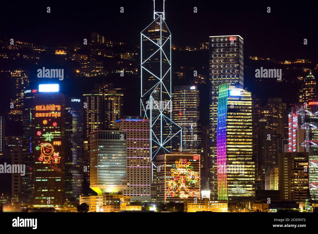 Hong Kong, China - Skyline of Victoria Harbor at night. Stock Photo