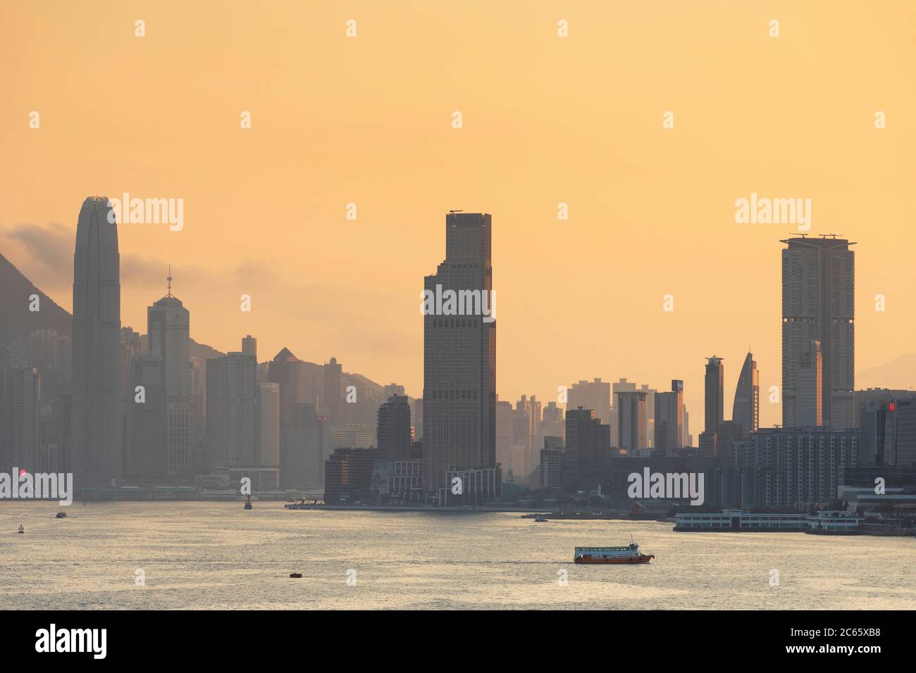 Hong Kong Island and Tsim Sha Shui skyline at sunset, Hong Kong Stock Photo