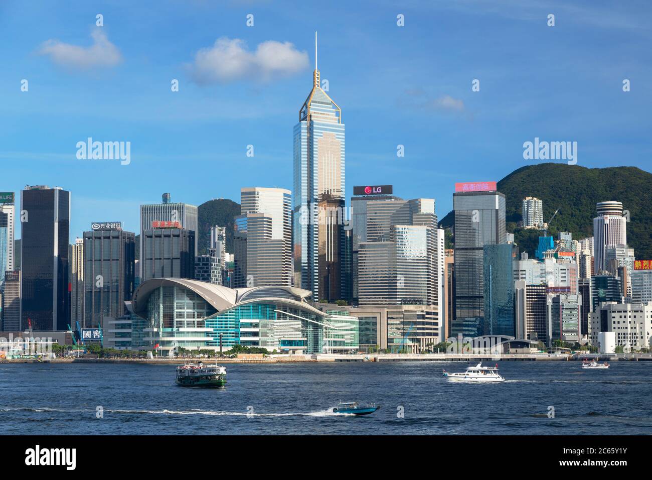 Skyline of Hong Kong Island and Star Ferry, Hong Kong Stock Photo