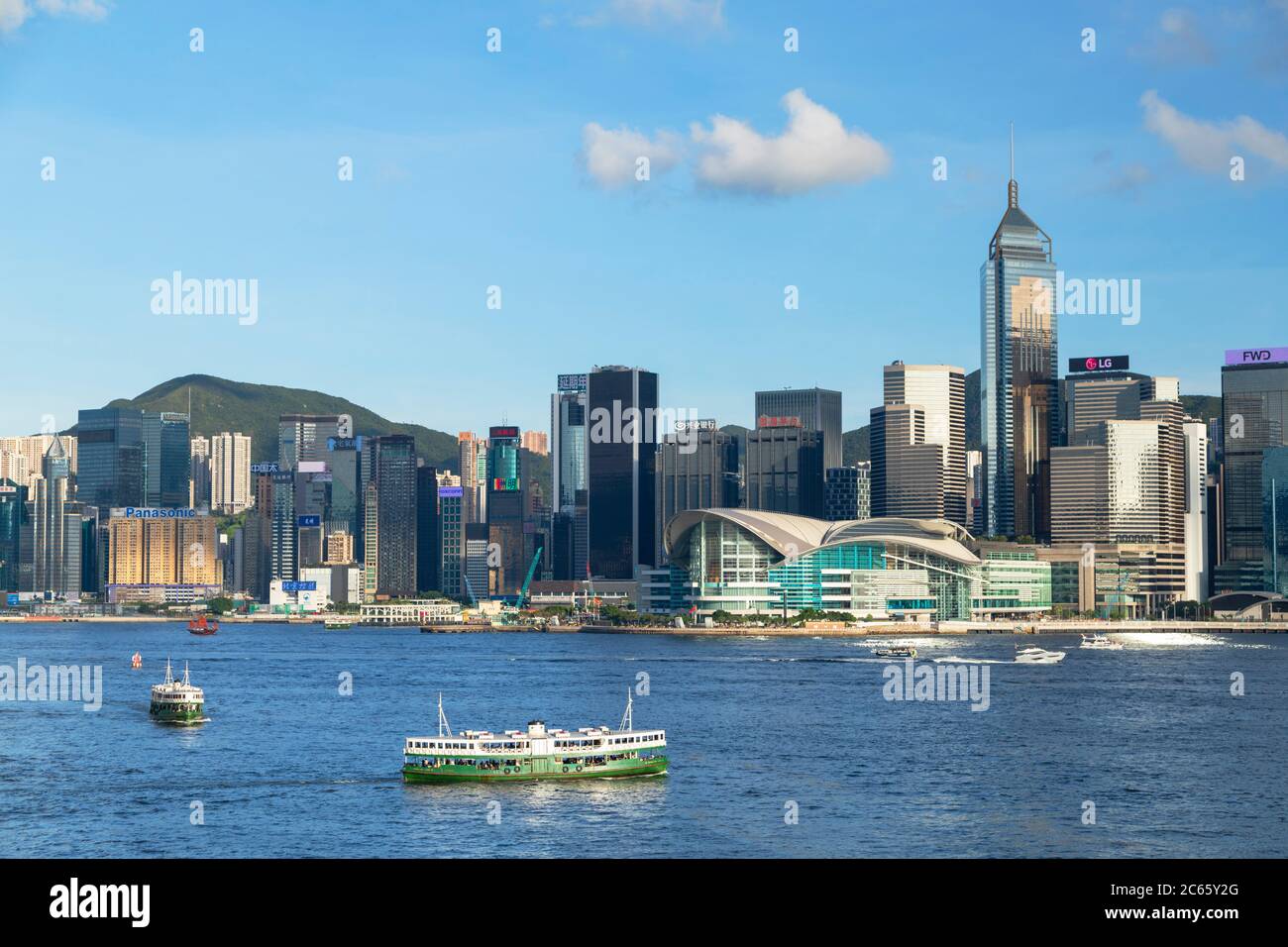 Skyline of Wan Chai on Hong Kong Island and Star Ferry, Hong Kong Stock Photo