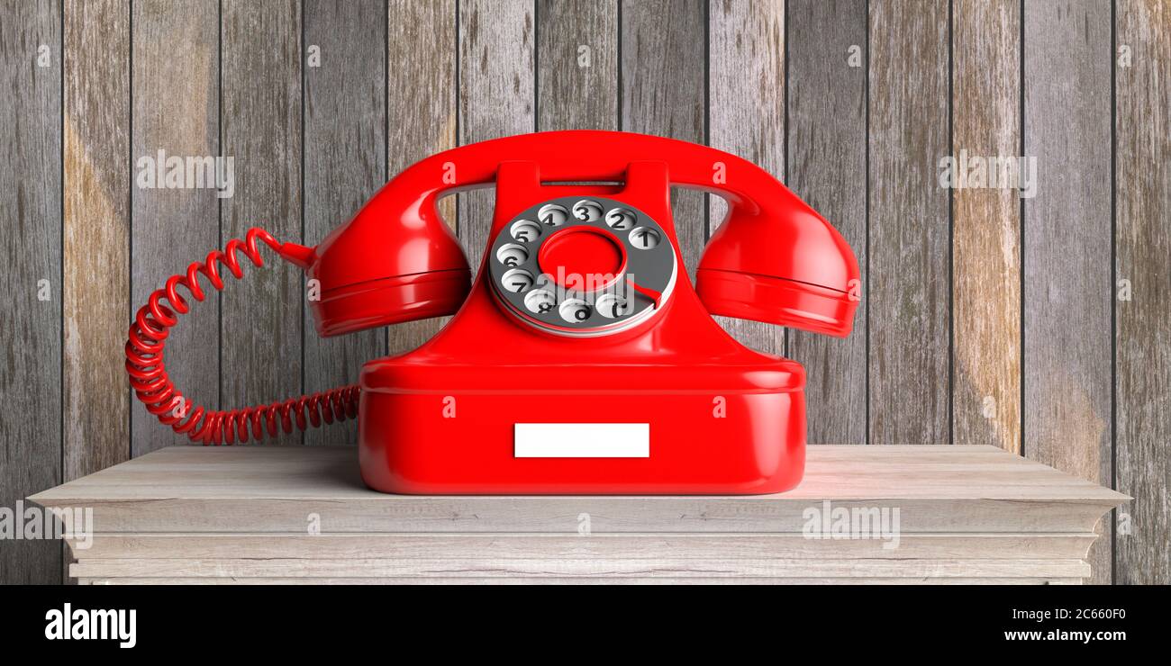 Vintage telephone. Red retro old fashioned dial phone on wooden table, wood wall background. 3d illustration Stock Photo