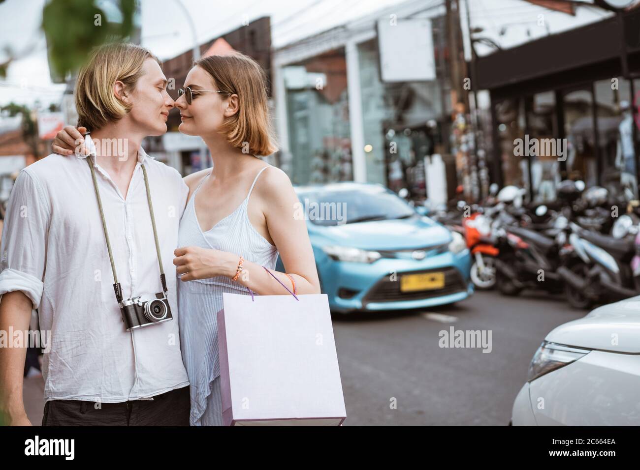 Tourist woman bali smiling man hi-res stock photography and images - Alamy