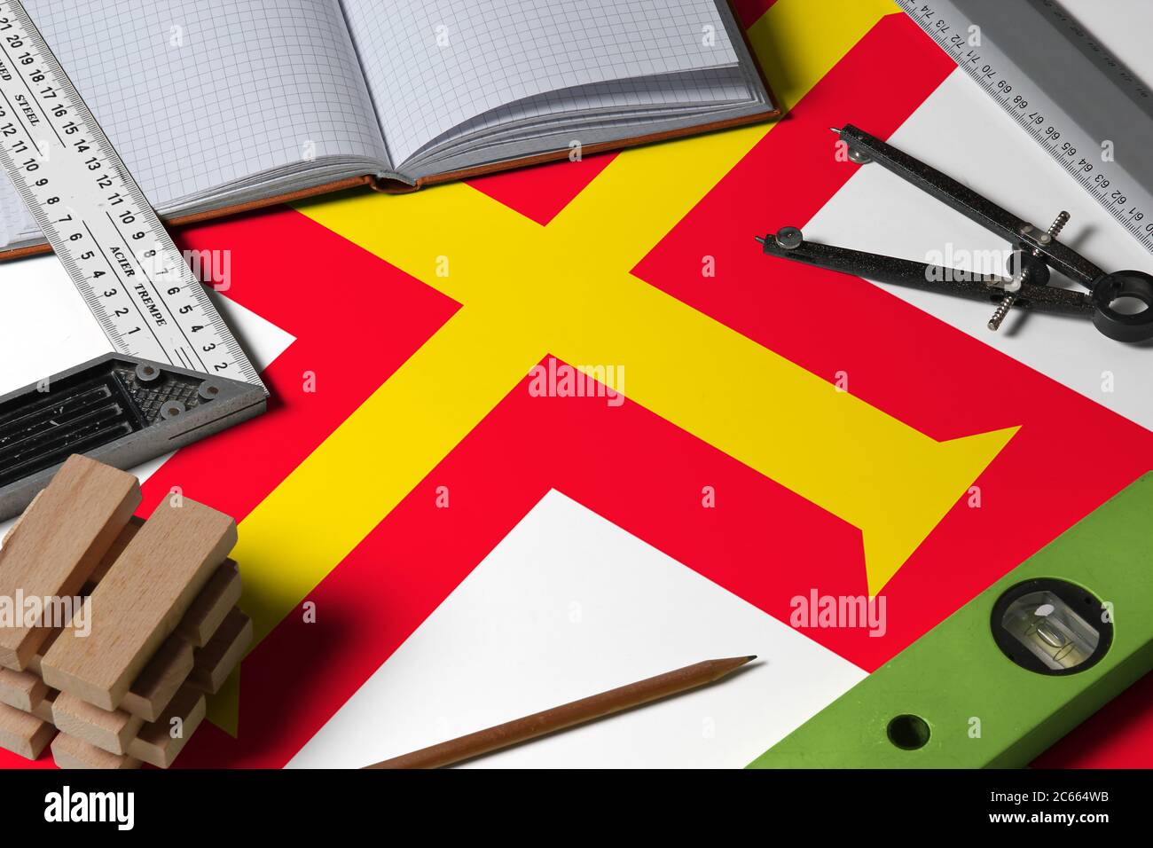 Guernsey national flag on profession concept with architect desk and