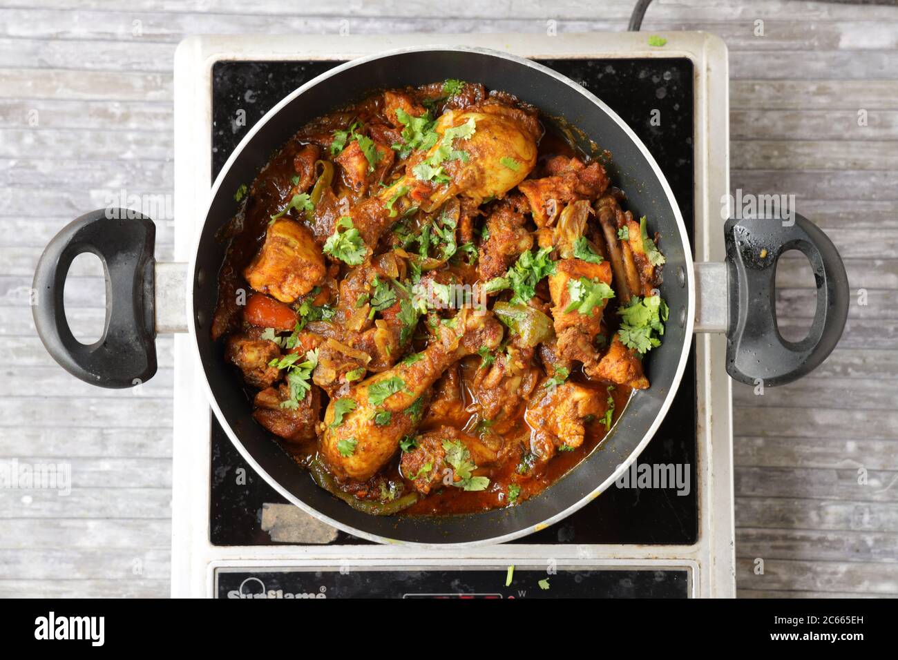 Chicken curry chicken masala ,Indian spicy chicken curry garnished with