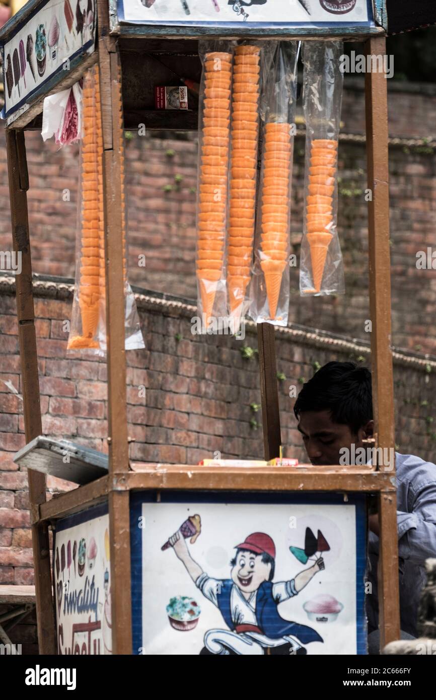 Ice cream seller at Swayambhunath Temple near Kathmandu in Nepal Stock Photo