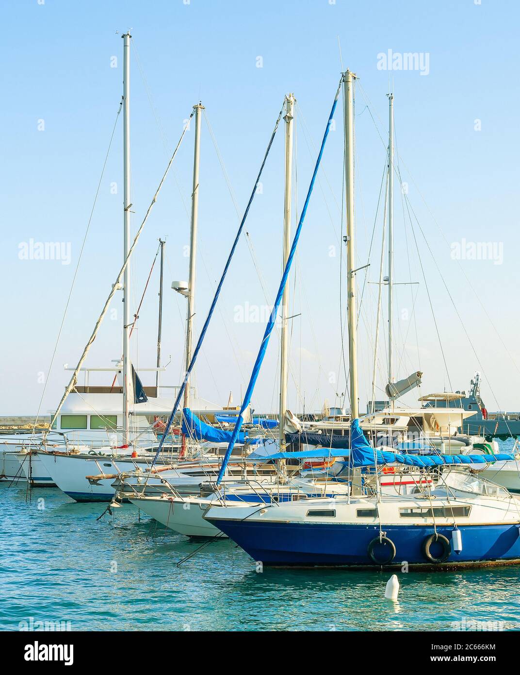 Yachts and motor boats in marina of Larnaca in sunny day, Cyprus Stock Photo