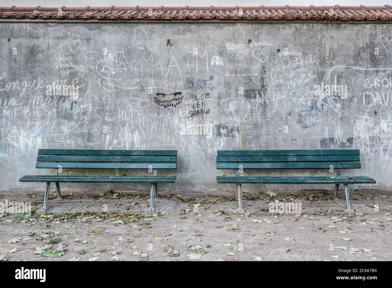 Two green benches on a wall in Paris, France Stock Photo Alamy