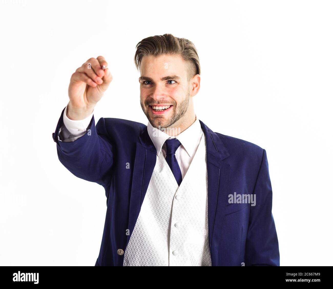 Modern technologies and business concept. Man with smiling face writes. Businessman holds pen or stylus and work with modern technology or touch screen, isolated on white background. Stock Photo