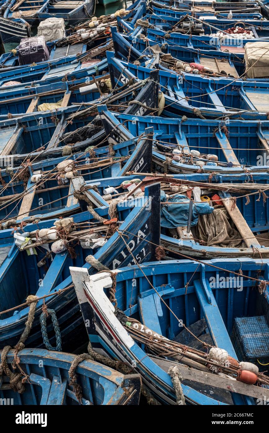Blue fishing boats in the port of Essaouira Stock Photo