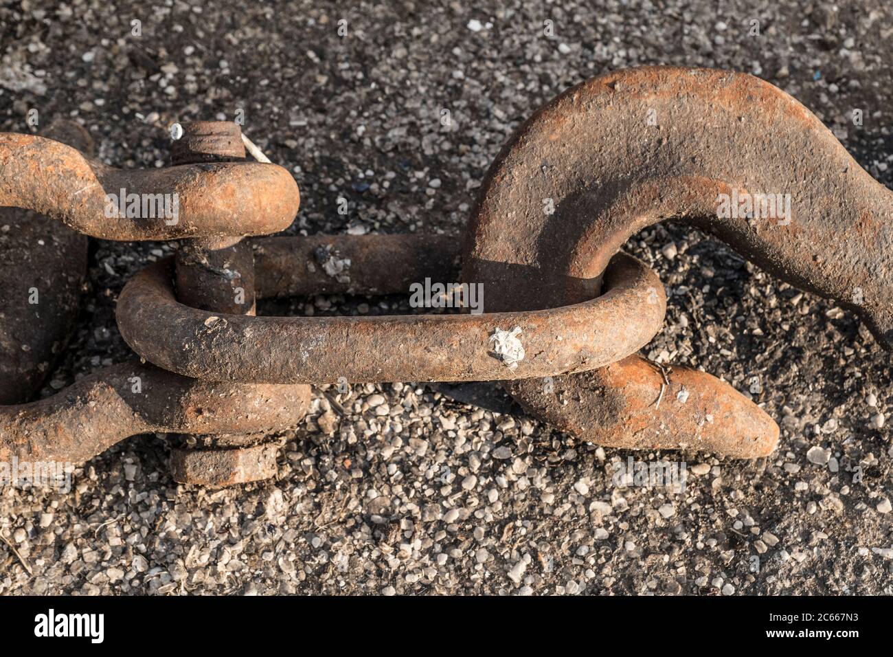 Iron hook with chain, close-up Stock Photo