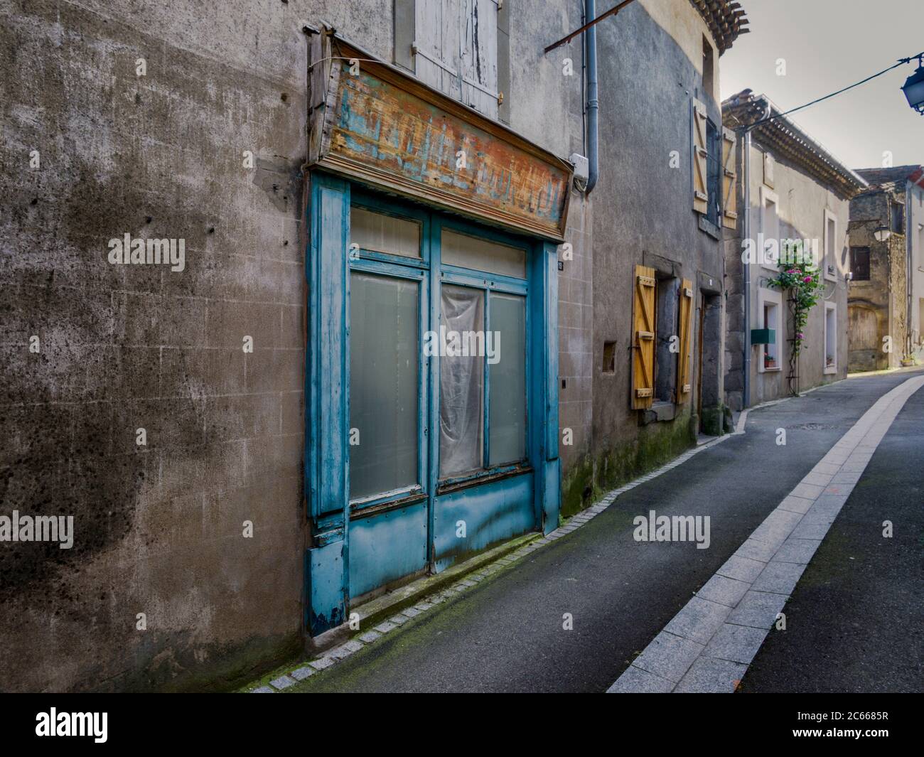 Closed retail store in Serviès en Val Stock Photo