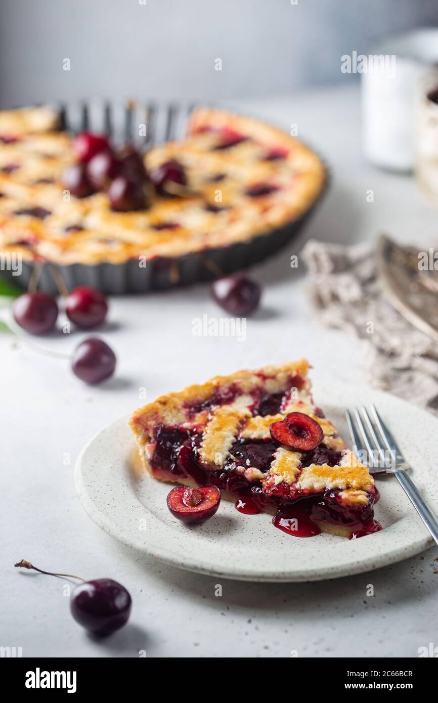 piece of Delicious homemade classic cherry pie with a flaky crust on ...